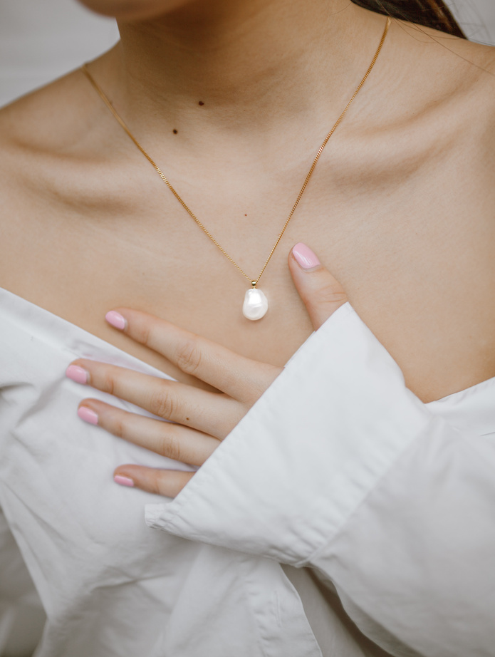 Woman Wearing a Necklace